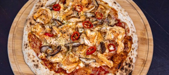The best pizza in the world, Brazilian shrimp pizza with shiitake mushrooms and red pepper.