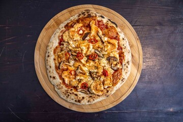 The best pizza in the world, Brazilian shrimp pizza with shiitake mushrooms and red pepper.