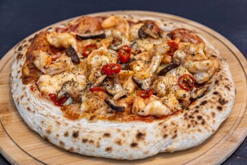 The best pizza in the world, Brazilian shrimp pizza with shiitake mushrooms and red pepper.