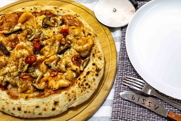 The best pizza in the world, Brazilian shrimp pizza with shiitake mushrooms and red pepper.