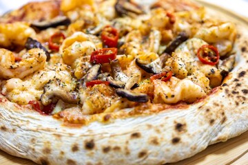 The best pizza in the world, Brazilian shrimp pizza with shiitake mushrooms and red pepper.