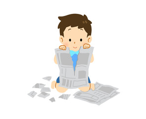 新聞紙で遊ぶ男の子
