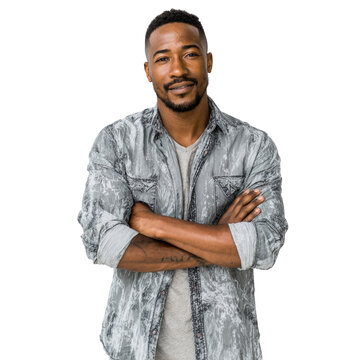A confident Black man with arms crossed, wearing a gray acid-washed denim shirt, against a transparent background. background removed
