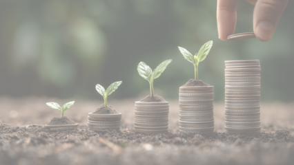 コインの山から芽生える植物による金融成長の概念