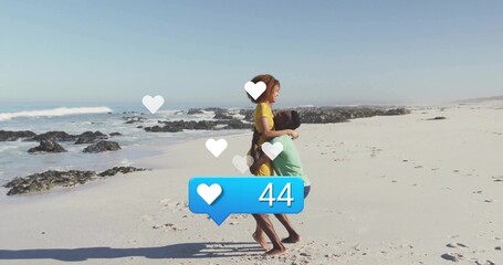Couple in yellow dress hugging on beach, floating heart icons, blue like counter 44