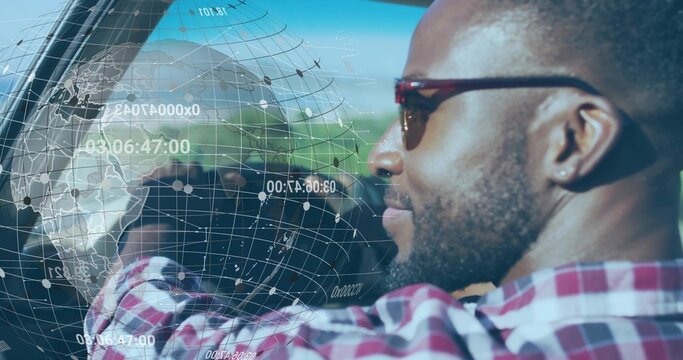Gripping wheel, African American driver in sunglasses navigating in car using HUD map, copy space - Powered by Adobe
