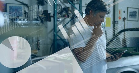 Analyzing mature mechanic holding tablet and thinking in mechanical workshop, with data overlay