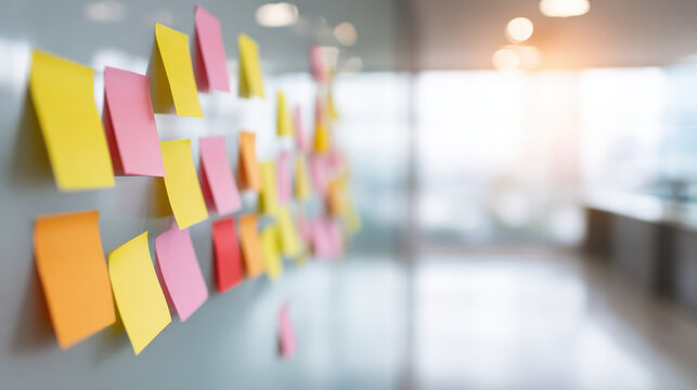 office space featuring minimalist design highlighting note board with blurred white text bars