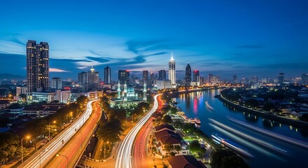 Fototapeta premium Cityscape at Dusk with River and Light Trails.