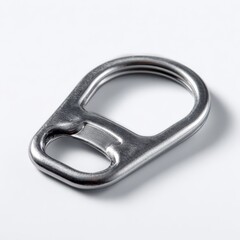 Close up of a single silver aluminum pull tab from a soda or beverage can isolated on a white background