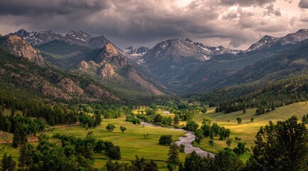 Obraz premium Mountain valley scene under dramatic sky