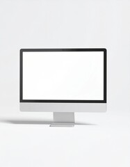 Fototapeta premium Sleek Minimalist Computer Monitor Displaying White Screen on Seamless White Background in Studio Lighting