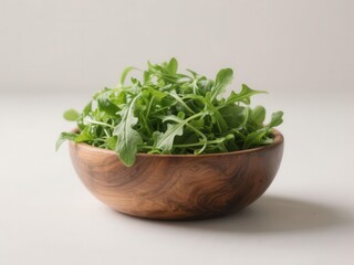 Fototapeta premium Fresh, vibrant green arugula overflowing a wooden bowl, farm, diet