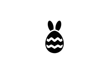 Black and white image of a rabbit with a white egg on its head