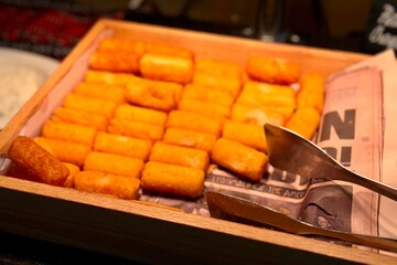 Box of fried food sticks, a popular fast food choice for finger food lovers