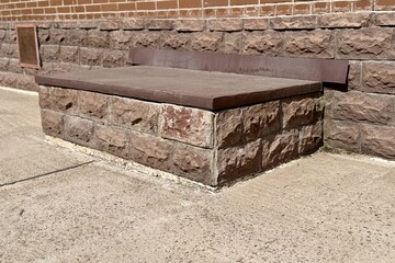 Window is covered with galvanized steel in brown color sheet to protect basement from precipitation during rain