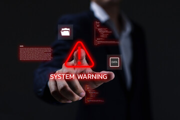 Businessman pressing virtual screen with red system warning alert, cybersecurity risk, data breach, and malware attack concept for IT security and digital protection background.