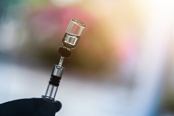Vaccine needle​ syringe​ hypodermic​ injection single dose for prevention​ immune treatment​ illness​ virus​ covid 19 ​ child​ and adult.concept antibiotic​ drug insullin.selective focus