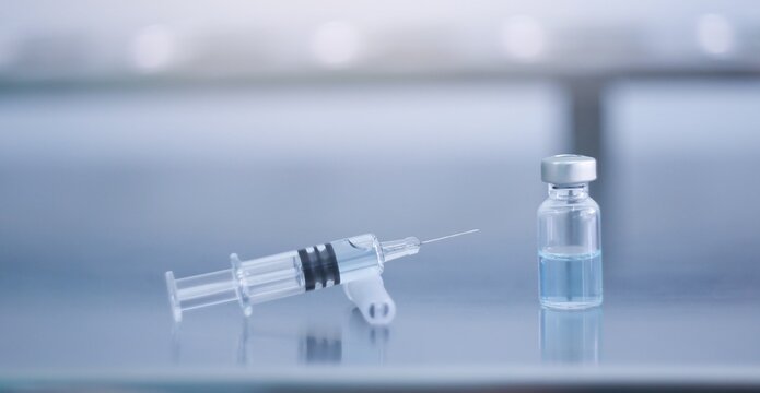 Vaccine needle​ syringe​ hypodermic​ injection single dose for prevention​ immune treatment​ illness​ virus​ covid 19 ​ child​ and adult.concept antibiotic​ drug insullin.selective focus