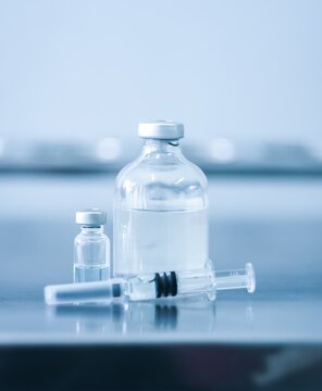 Vaccine needle​ syringe​ hypodermic​ injection single dose for prevention​ immune treatment​ illness​ virus​ covid 19 ​ child​ and adult.concept antibiotic​ drug insullin.selective focus
