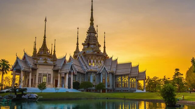 Timelapse of Wat Non Kum or Wat Luang Pho To in Sikhio District, Nakhon Ratchasima, Korat, Thailand is a symbolic place of temples in Thailand. At sunset, there is a reflection in the water.