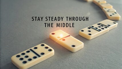 Inspirational Photo of Dominoes with Motivational Text and Focus