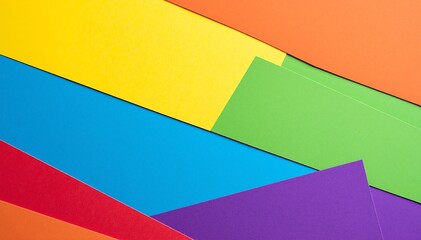 Obraz premium A vibrant close-up of assorted colorful paper pieces, showcasing a mix of textures and hues, including reds, blues, yellows, and greens, layered artistically.