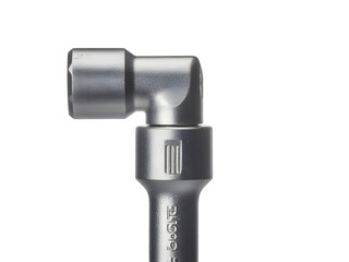 Close-up of a silver metal ratchet wrench a tool for tightening bolts isolated on white