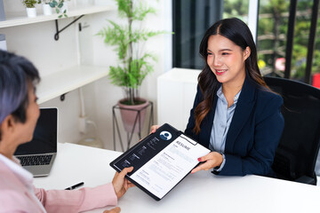 Female HR specialist focusing on applicants' CV documents, human resource development.