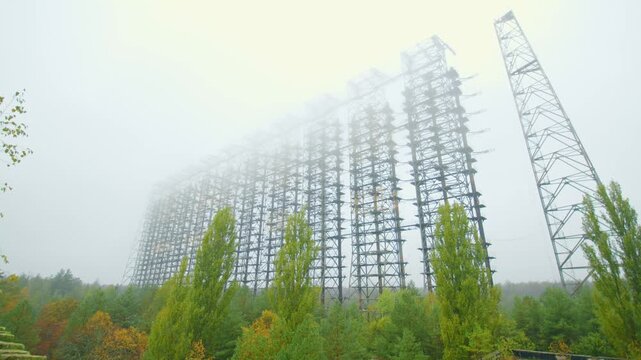 footage showcasing the colossal and enigmatic Duga 1 over the horizon radar system, famously known as the, Russian Woodpecker,  nestled within the haunting Chernobyl Exclusion Zone.