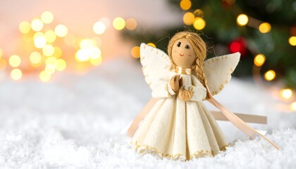 Small angel figurine, soft white, snow, lights