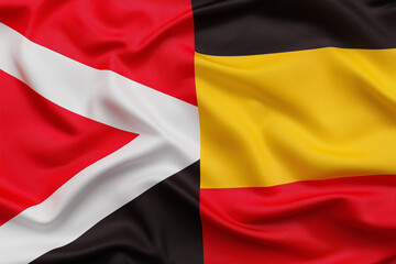 High resolution image of Kenya and Uganda national flags together, full frame filled with waving fabric texture, clean sharp folds, photorealistic