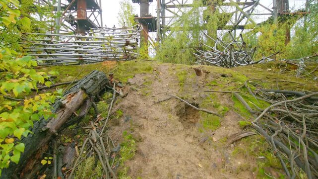 Footage capturing the imposing and decaying structure of the Duga 1 over the horizon radar system, also known as the, Russian Woodpecker, located within the Chernobyl Exclusion Zone in Ukraine.