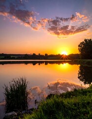 Sunrise over tranquil lake (1)