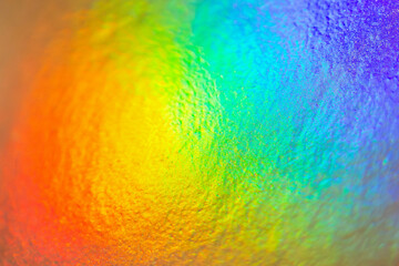 Abstract blur holographic rainbow foil iridescent background