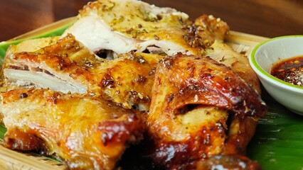 Grilled spicy chicken wings with herbs.
