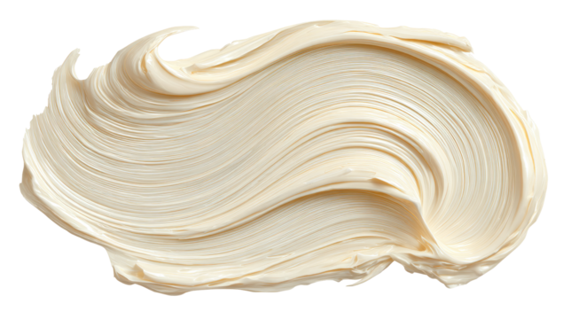 Creamy, light beige substance spread in a swirling, uneven pattern