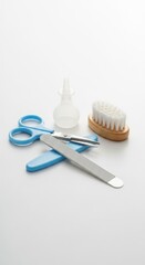 Baby Grooming Kit Assortment on White Surface with Soft Lighting