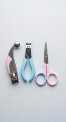 Baby Manicure Set Arranged On White Background Featuring Pink Blue And Silver Tools