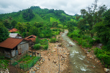 A traditional Laotian house in the countryside of Houaphanh Province, Laos. Living next to the river.