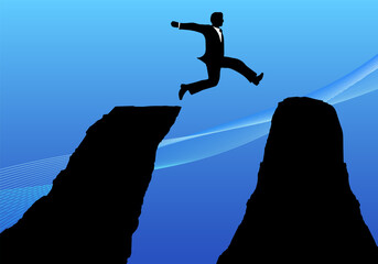 仕事の障害を乗り越えるビジネスマンのシルエット