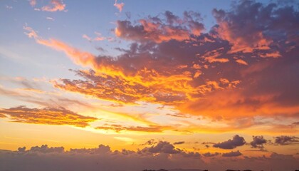 Obraz premium Dramatic Sunset Sky Orange Clouds over Horizon.