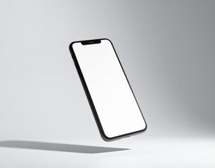 Sleek Black Smartphone with Blank White Screen Floating on Gray Background in Studio Lighting Presentation