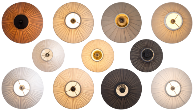 Overhead shot showcasing varied lamp shades. Pleated fabric, circular designs, and warm lights. Diverse colors