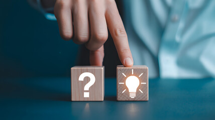 Find solutions with creative thinking by turning question into idea on wooden blocks