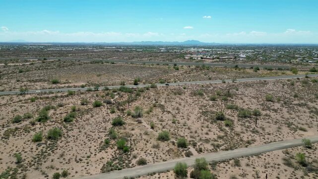 Drone view over the arid desert landscape near Apache Junction, Arizona, with sparse vegetation