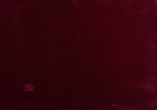 A Dark Red Velvet Fabric Texture Background