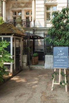 LONDON, UK - JULY 21, 2018:  Exterior view of the The Secret Herb Garden at Royal Horseguards Hotel in Whitehall Court with sign