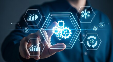 Finger touching a glowing holographic hexagonal interface displaying gears and data visualizations