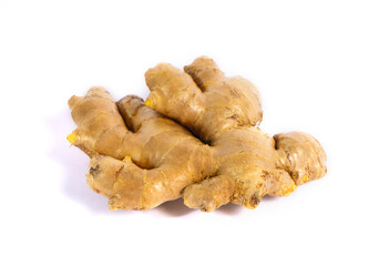 Fresh ginger root (Zingiber officinale) isolated on a white background. This rhizome is popular as a cooking spice and a traditional herbal remedy.